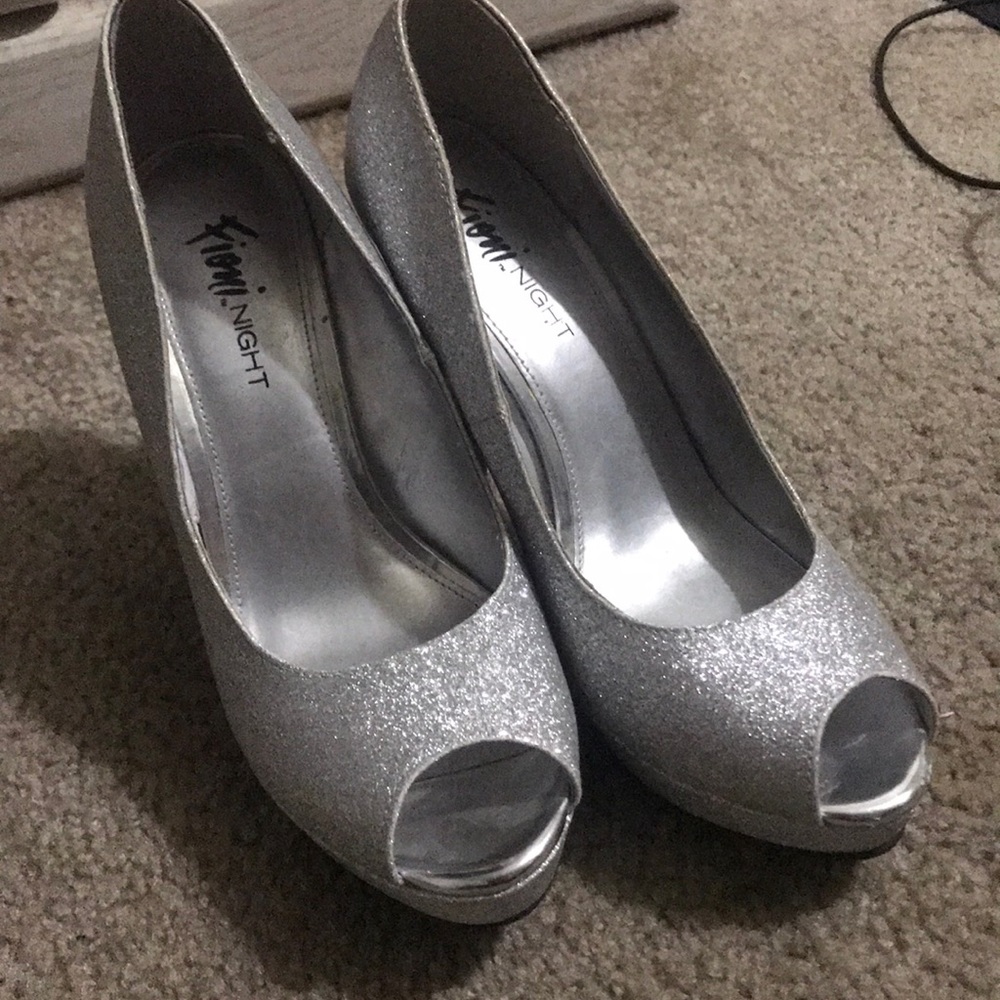 New heels never use Size 8 color: Silver